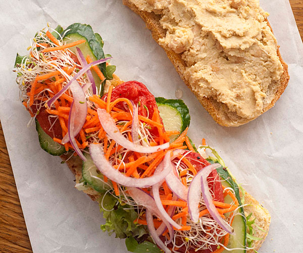 Lemony Hummus with Cucumber, Radish Sprouts, and Red Onion